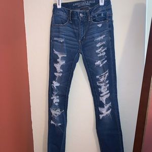 Super stretch a lot of holes medium wash jeans